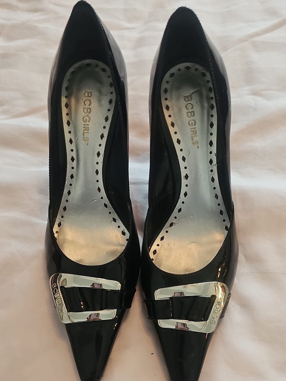 BCBGeneration Black Patent Pointed Toe Heels with Silver Buckle Detail